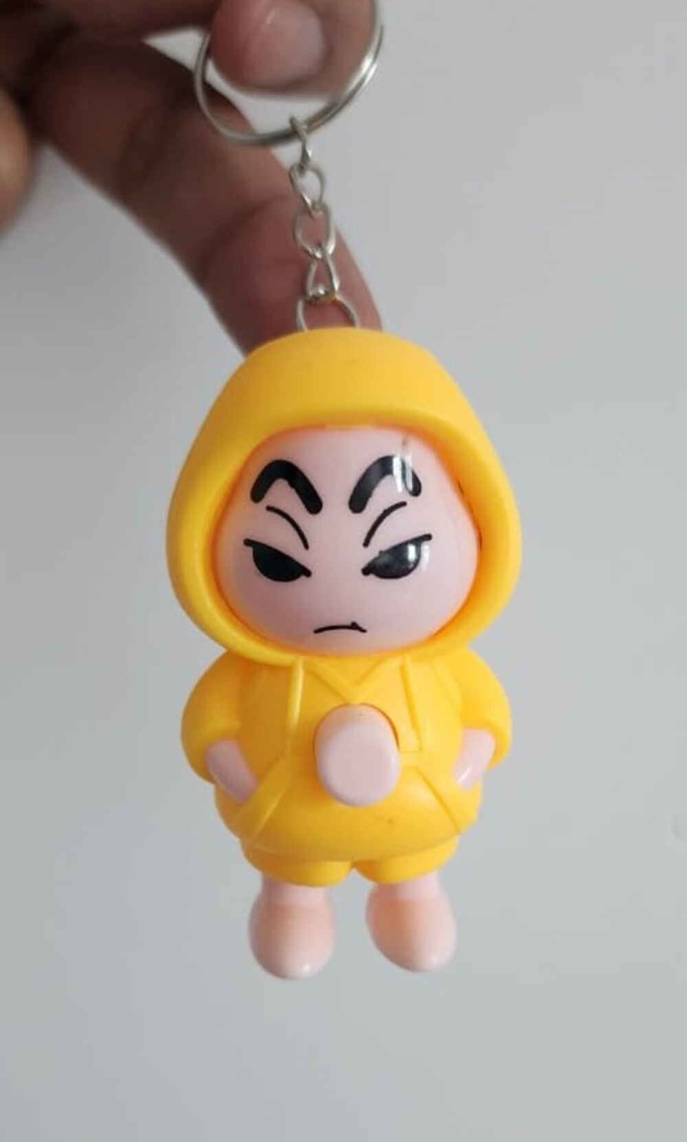 Face Changing Toy Keychain Yellow  – Cute Cartoon Mystery Face Changing Figurine, Trendy Portable Backpack Accessory, Fun Gift for Kids, Teens & Anime Fans