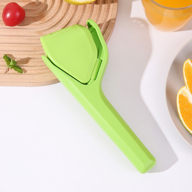 Lemon Squeezer - Green Manual Citrus & Lime Juicer with Built-In Strainer, Easy Two-Hand Press, Space-Saving Flat Design, Handheld Kitchen Tool-1